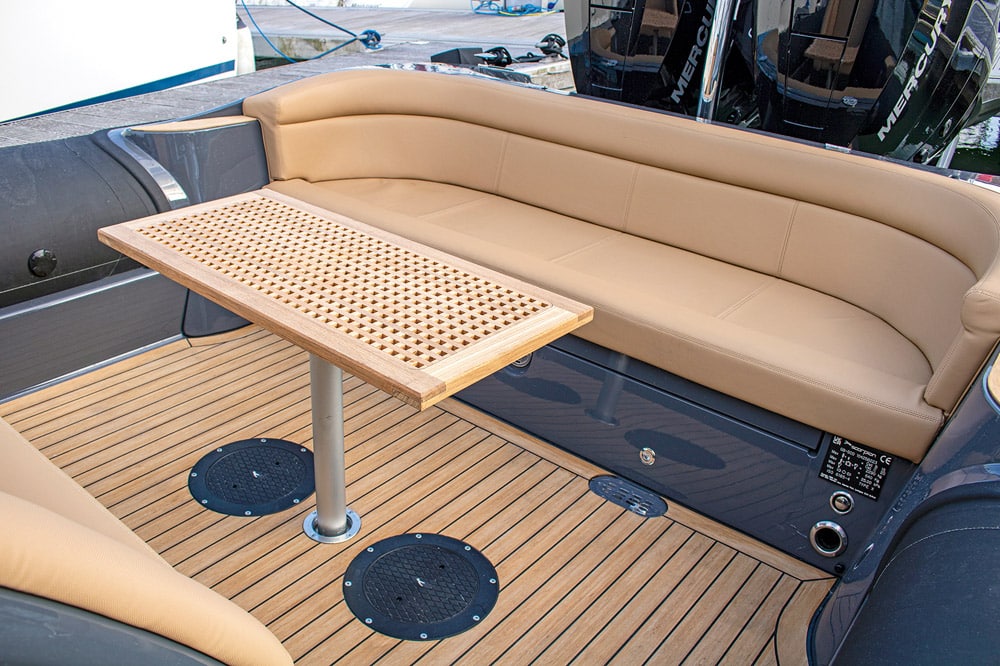 Scorpion Sting RIB The table is stored behind the helm seating.