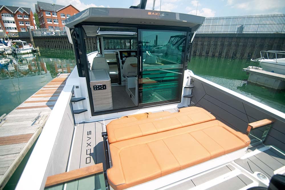 Saxdor 320 GTCThe aft bench seat converts to a sunbed.