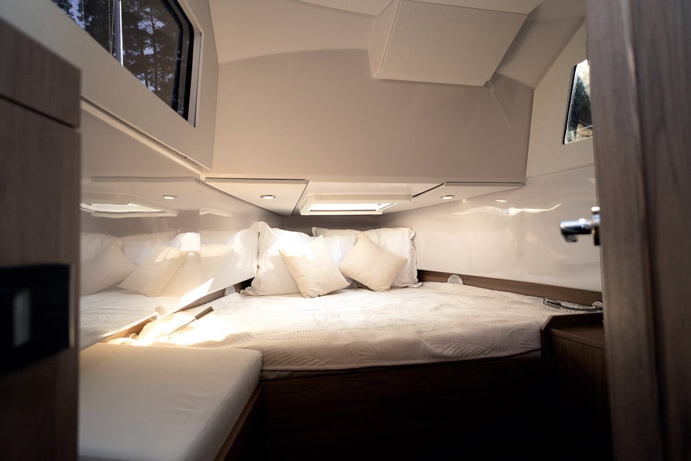 Virtue V10 - A long double bed, with headroom aft.
