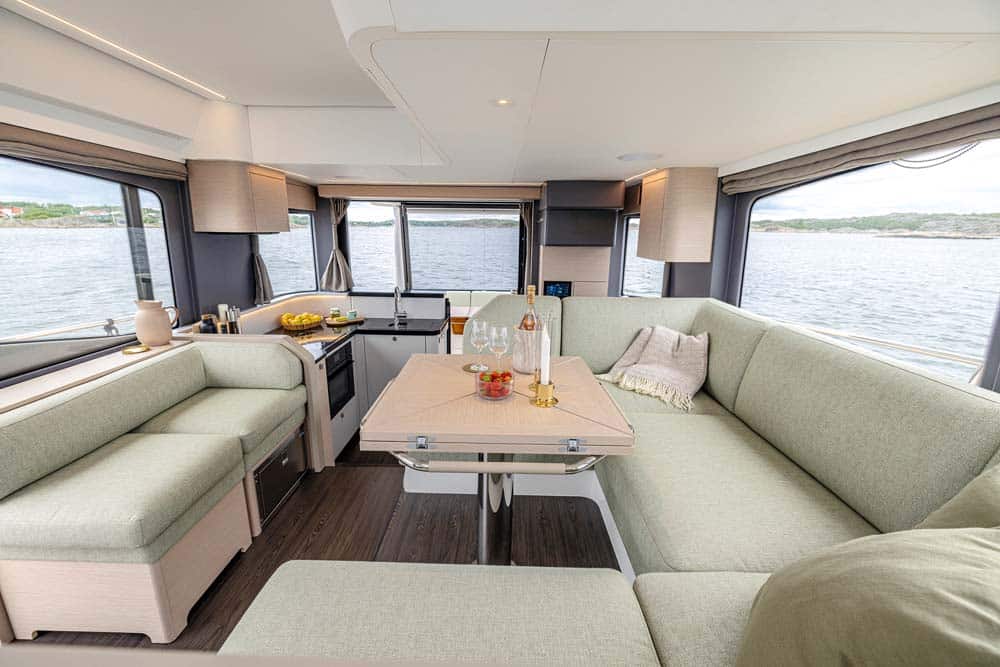 Bright airy saloon and galley.