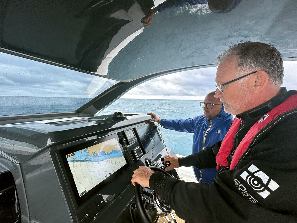 Mark at the helm of the Honda test craft. Honda V8 BF350