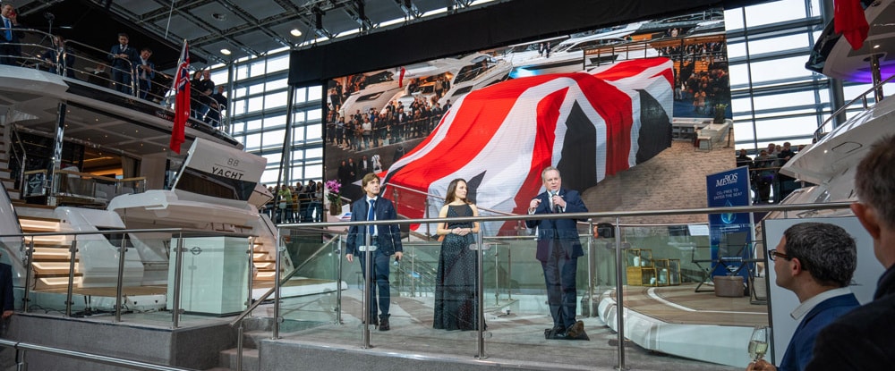 Sunseeker launch - boat hidden under Union Jack flag