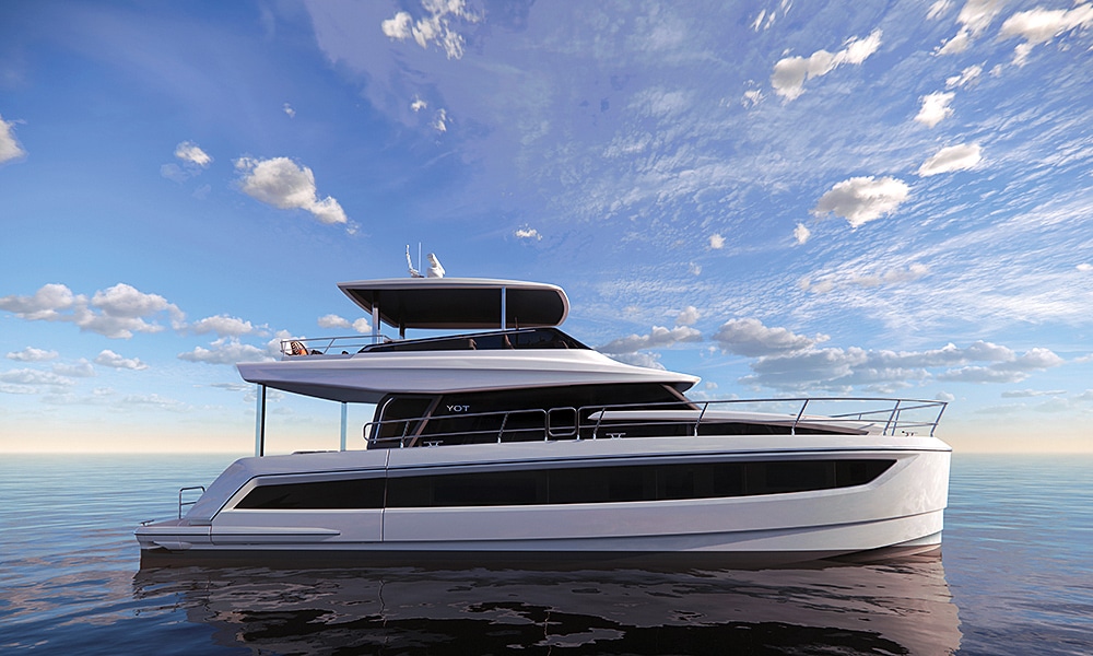 Modern twin-hull YOT 53 power catamaran cruising on calm sea under a bright sky, showcasing its sleek design and spacious upper deck.