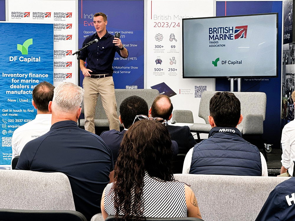 Speaker presenting to marine professionals at a British Marine Trade Association seminar during Southampton International Boat Show.