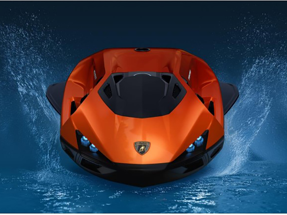 Lamborghini SEABOB SE63 electric watercraft skims across blue water.