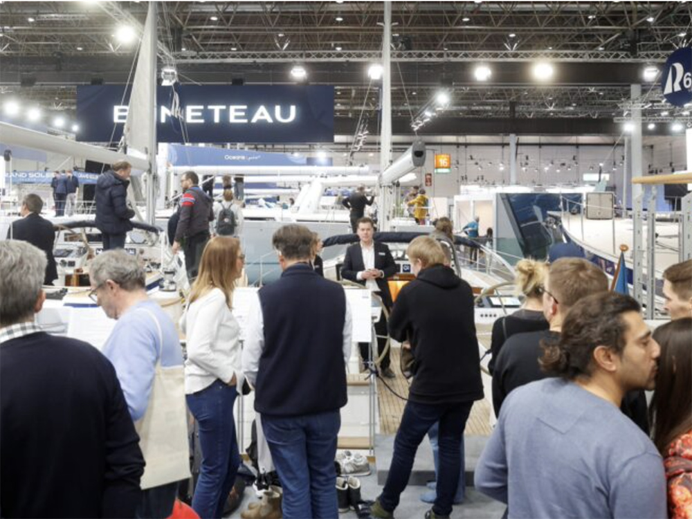 Visitors browse at the Beneteau stand during boot Düsseldorf, the world’s largest boat and water sports show.