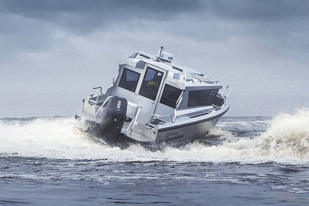 Ockelbo stern view with outboard engine and backing to starboard