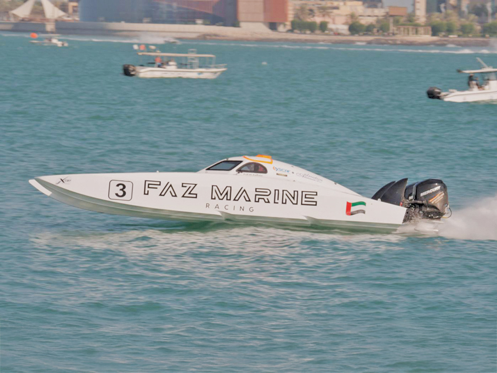 High-speed FAZ Marine Racing XCAT powerboat running across Kuwait waters with twin Mercury engines during the championship event.