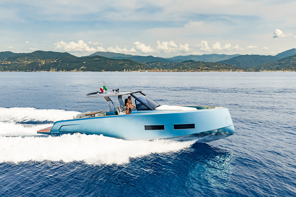 Pardo 43 walkaround motor yacht underway at speed, showing updated hull windows and integrated hard top.