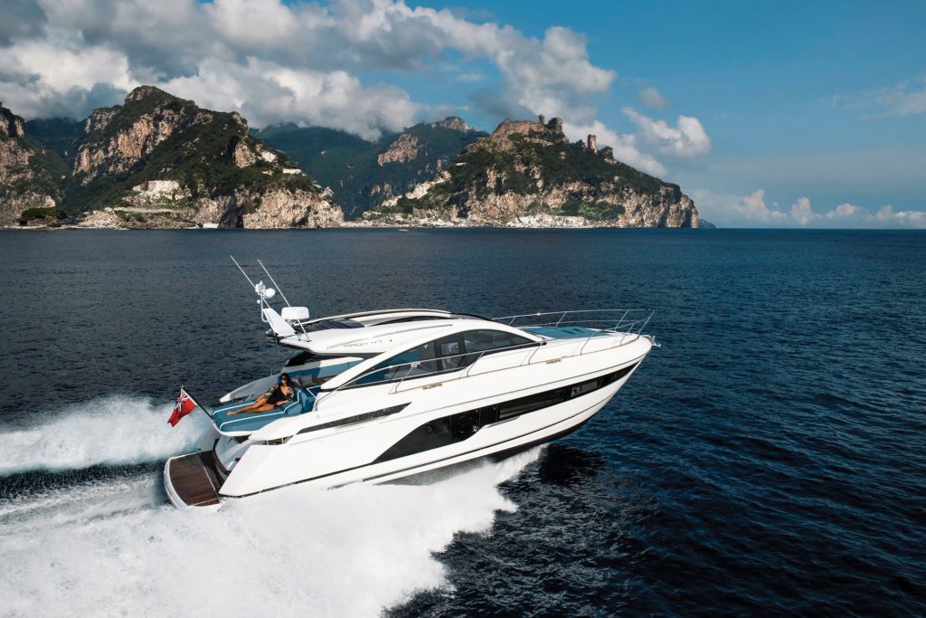 Fairline Targa 47 at sea with mediterranean island in background